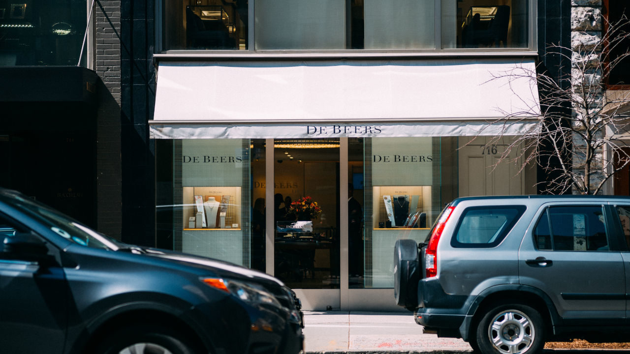 Establishing exterior shot of store entrance, De Beers Jewellers, NYC