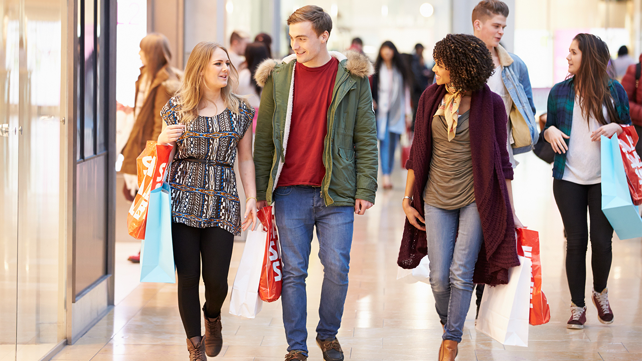Shoppers in a mall. (Shutterstock)
