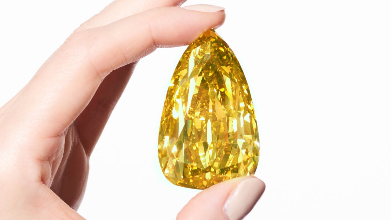 Yellow diamond falls short of estimate with final price of $12.4 million.
