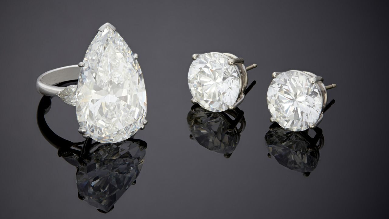 John Moran auctioneers diamond ring and earrings