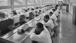 Swiss watches Universal Geneve watchmakers working in the factory, ca. 1960s 1280b USED 131223