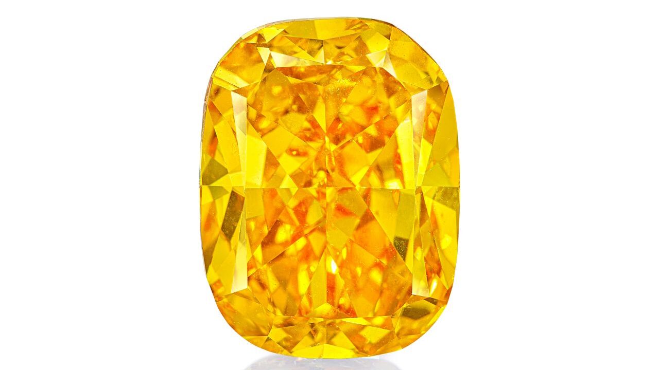 A rare 7.01-carat, fancy-vivid-yellowish-orange diamond ring will lead sale.
