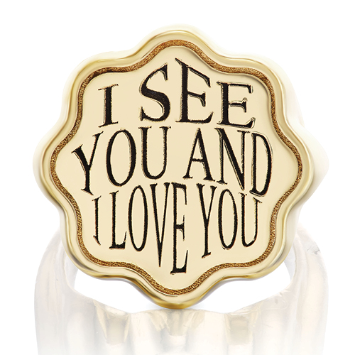 Retrouvaí x Tiny 
Gods signet ring in 14-karat 
gold with the message “I see 
you and I love you.” image