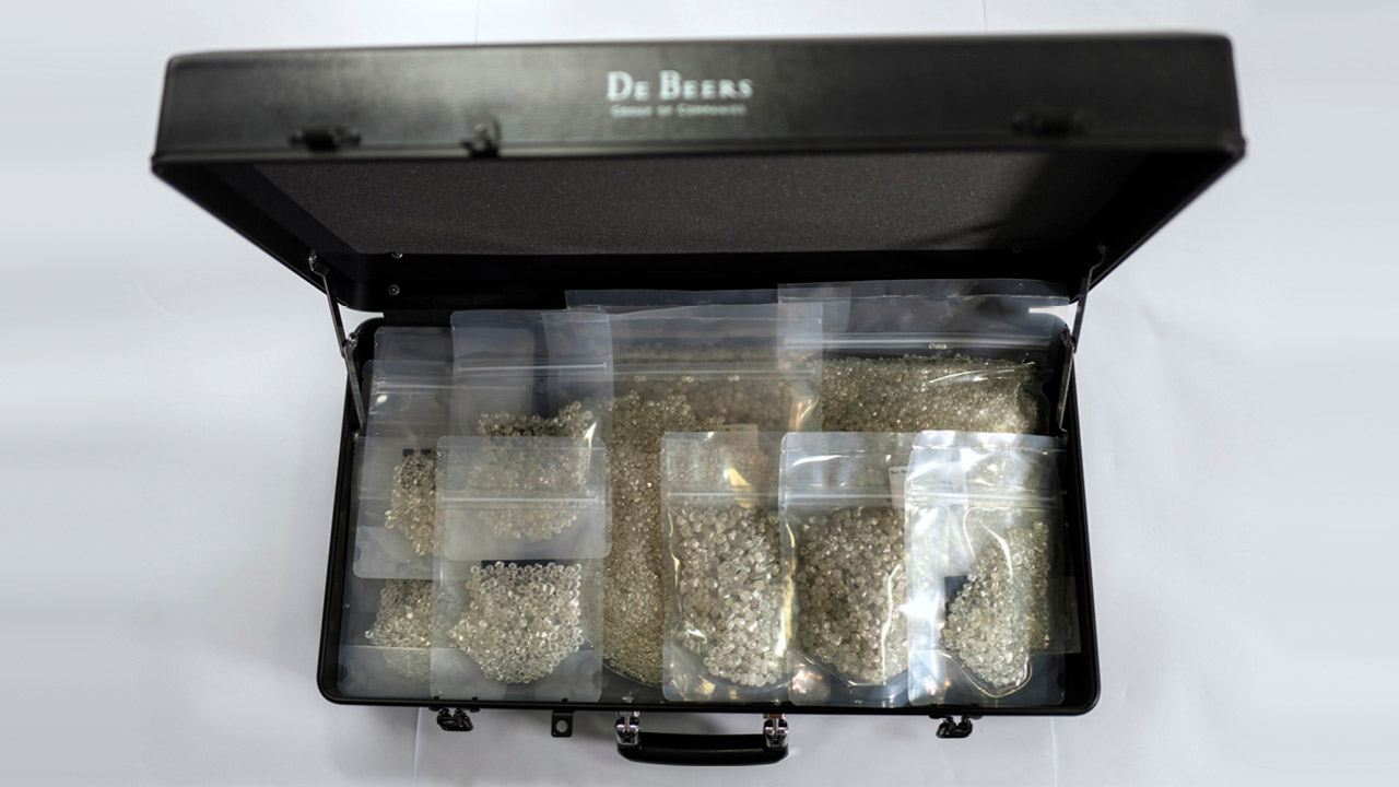 rough diamonds in a de beers sight box image