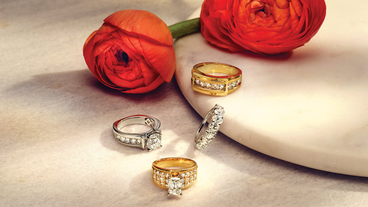 Image of roses set amidst diamond bridal rings