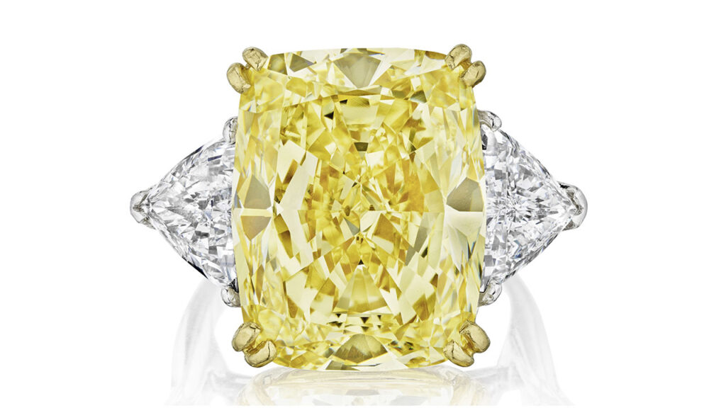 Cushion-cut fancy-yellow diamond ring at Bonhams image