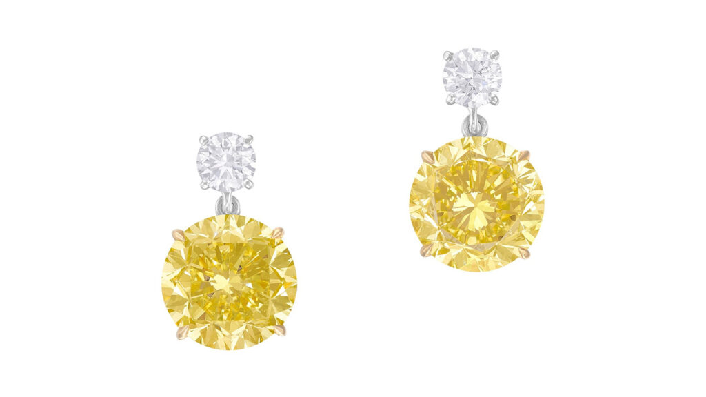 Fancy-intense-yellow, flawless diamond earrings at Philllips image