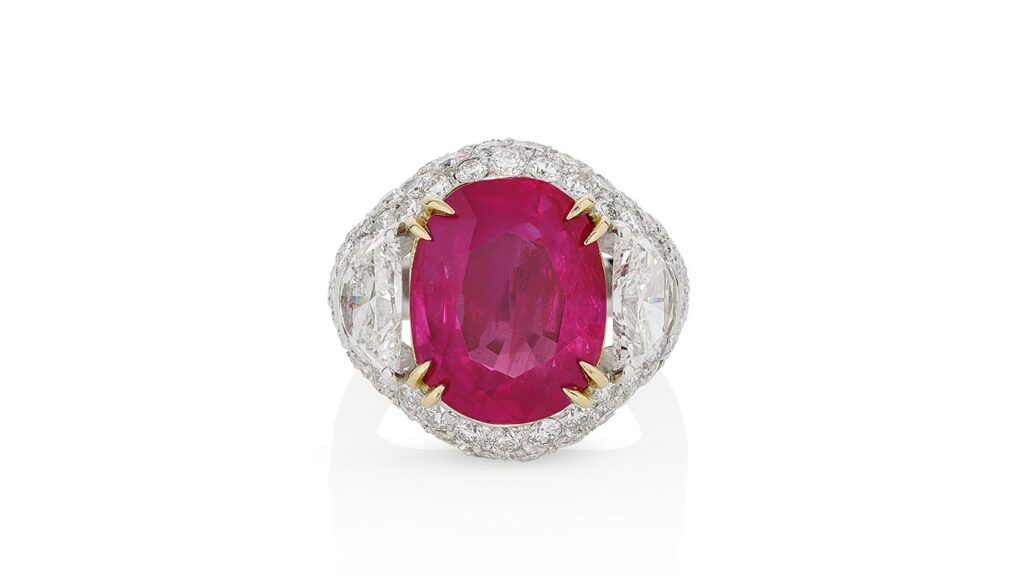 Ring with a 10.59-carat Burmese ruby in a diamond surround at Phillips image