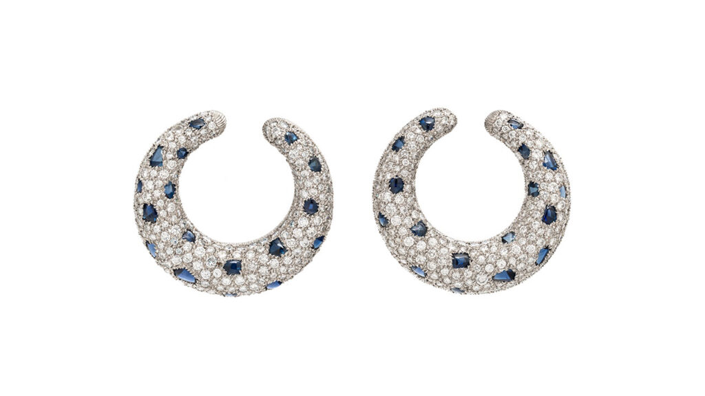 Pair of Cartier Panthère hoop earrings featuring diamond and sapphires at Freeman's | Hindman image