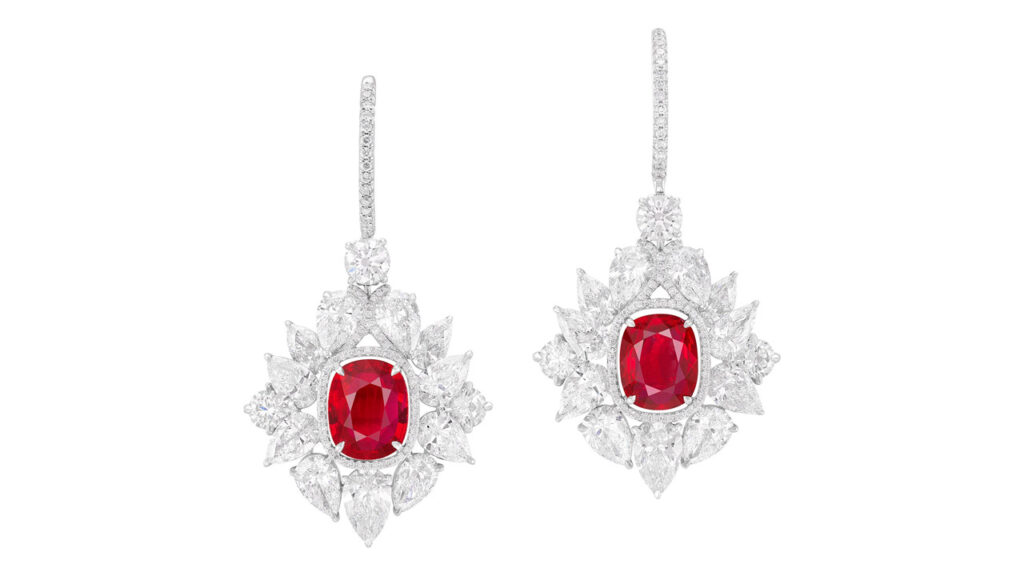 This pair of earrings bears cushion-shaped Burmese rubies weighing 2.05 and 2.10 carats, surrounded by lozenge-shaped diamonds and decorated with pear and brilliant stones image