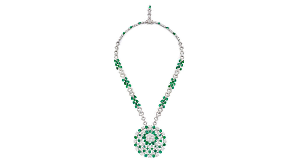 A Graff necklace sports a pendant with brilliant-cut, 3.10-carat diamond and brilliant-cut, pear-shaped diamonds and pear-shaped and circular-cut emeralds. The necklace showcases brilliant-cut diamonds and pear-shaped emeralds image