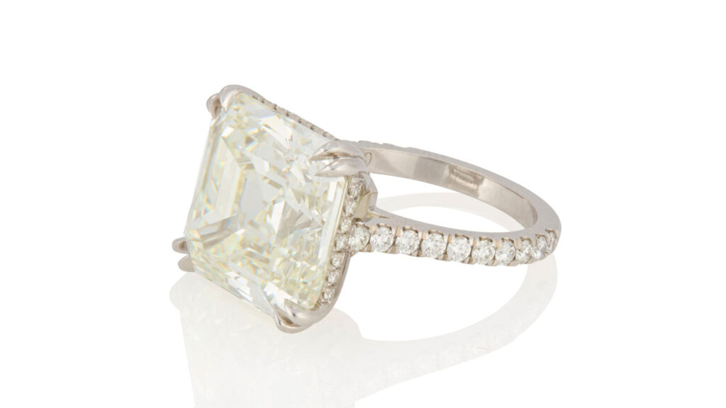 Ring features a square emerald-cut, 15.57-carat diamond, accented by round diamonds on the band by John Moran image