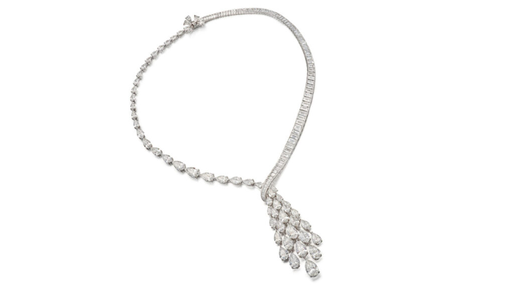 This Graff necklace is designed as ribbons of graduated pear-shaped and baguette diamonds, supporting a tassel of pear-shaped diamonds, with stones weighing between 0.90 and 3.01 carats by Sotheby's image