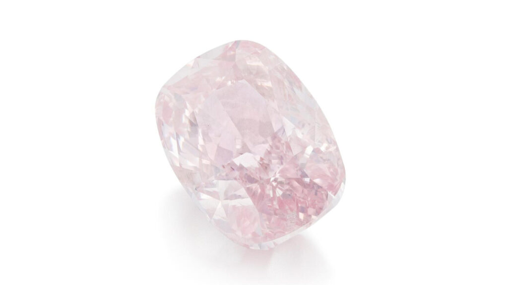 A gold necklace sporting a cushion-shaped, 4.03-carat, fancy-pink diamond by Sotheby's image