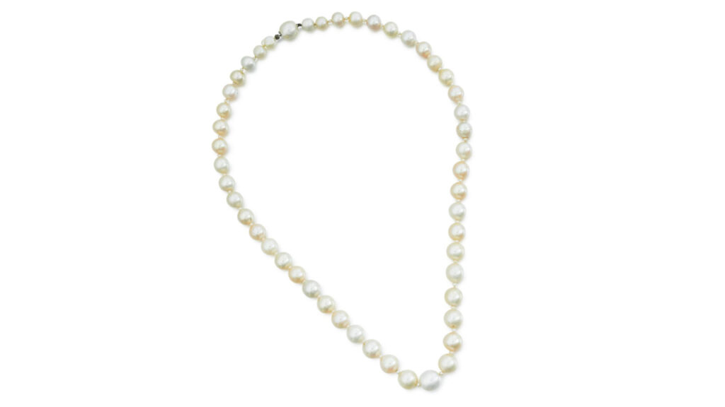 his necklace features 48 graduated natural pearls, alternating with seed pearls by Sotheby's image