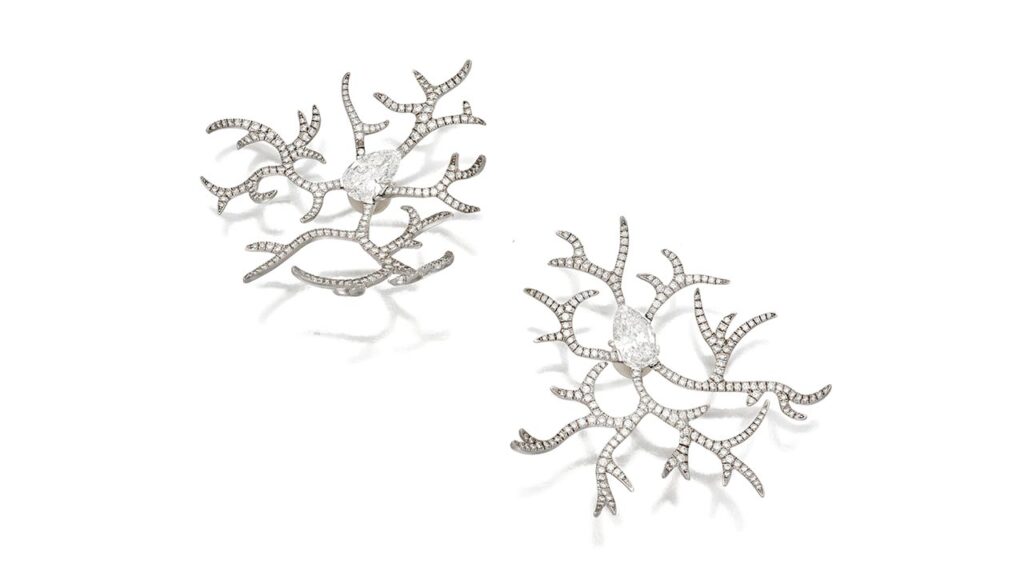 A pair of JAR diamond ear clips designed to resemble frost at Sotheby's image