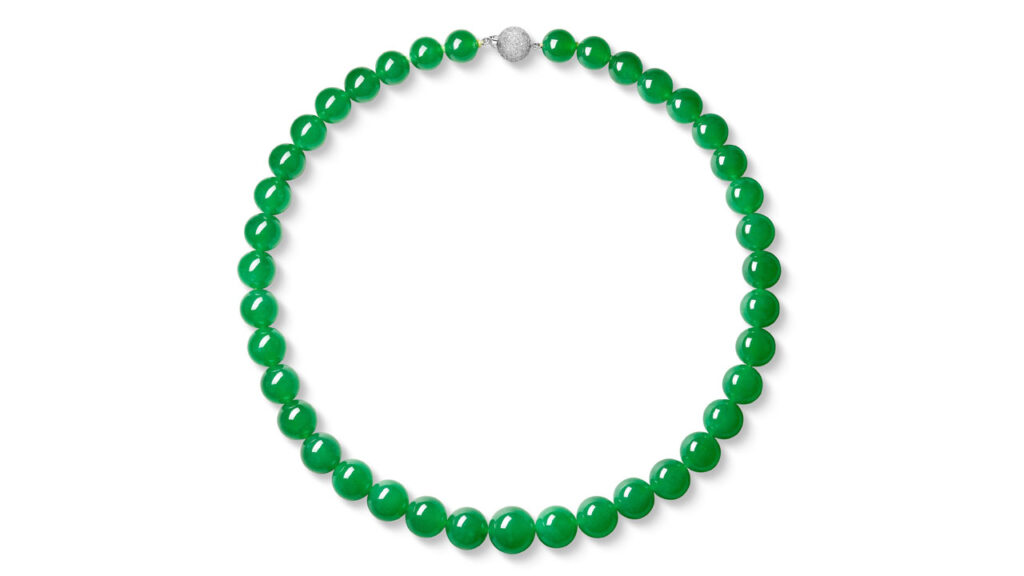 This necklace comprises 39 graduated intense-green jadeite beads, connected by a boule clasp featuring brilliant-cut diamonds at Sotheby's image