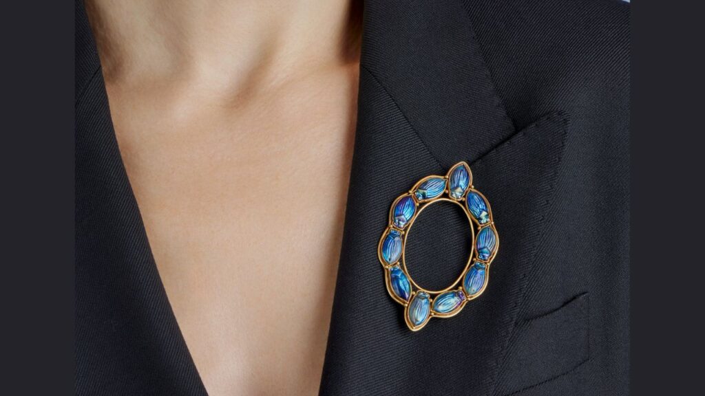 A favrile glass and gold Scarab brooch by Louis Comfort Tiffany, circa 1909 image