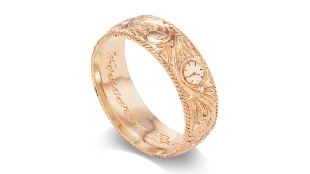 A carved gold band from Fewer Finer image