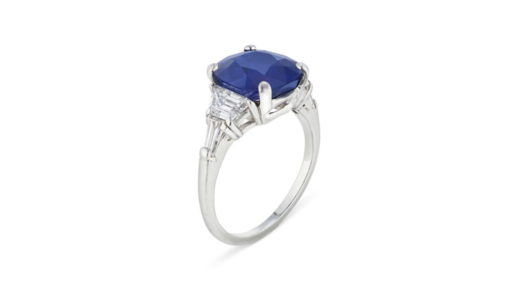 This ring features a cushion mixed-cut 4.81-carat Kashmir sapphire between trapezoid diamonds at Christie's image