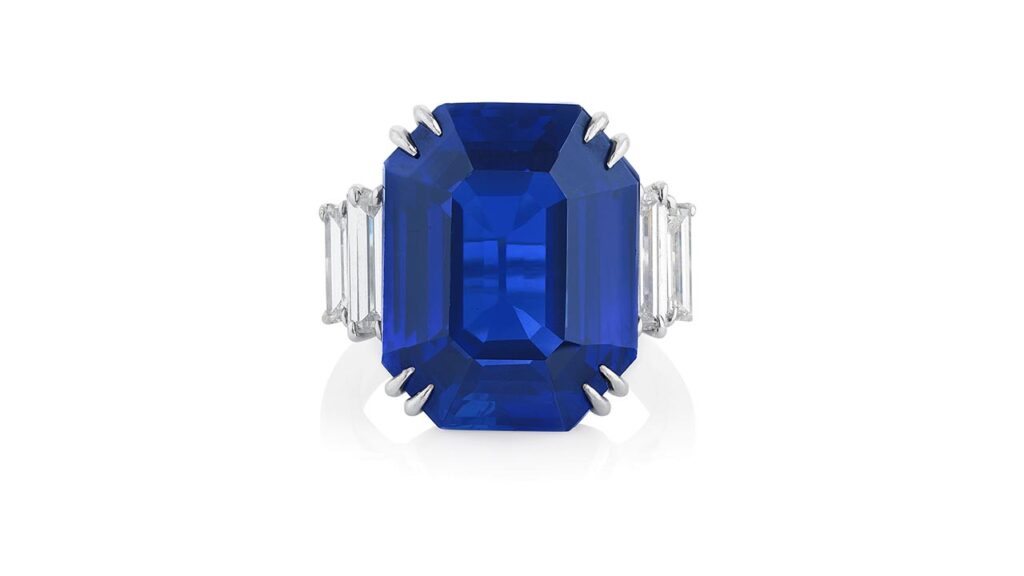 This ring features a step-cut, 18.09-carat Kashmir sapphire with diamond shoulders at Phillips image