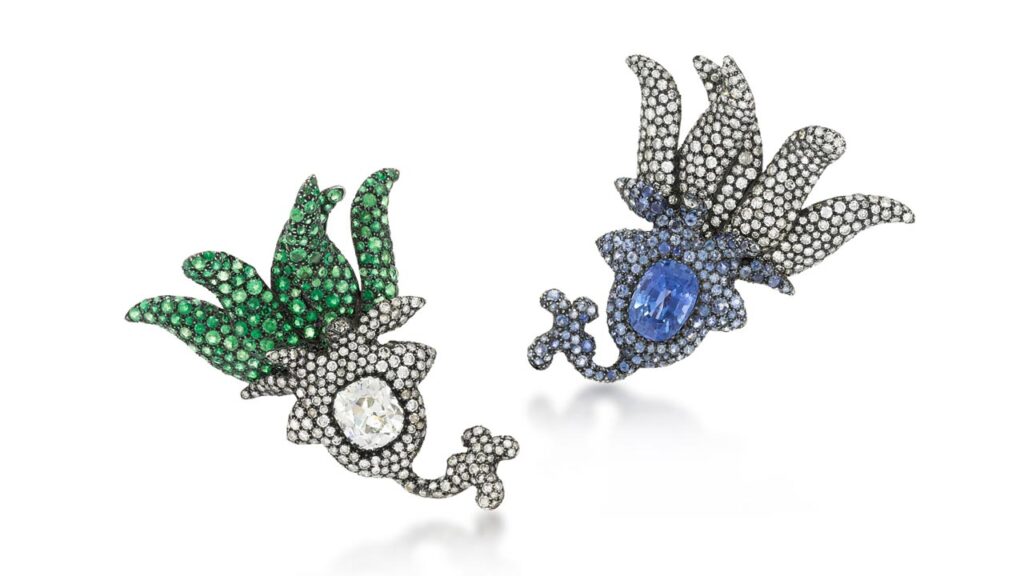 These JAR ear clips are another designer lot, featuring an oval sapphire in a pavé-set circular-cut sapphire frame and an old mine-cut diamond embellished with tsavorite garnets at Sotheby's image