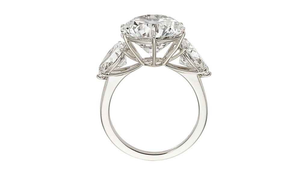 A ring featuring a round brilliant, 5.90-carat, D, VVS2 diamond and two additional pear-shaped diamonds at Heritage Auctions image