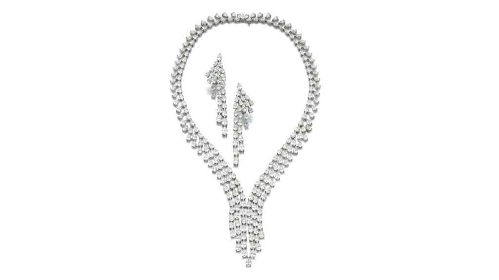 This Schreiner set includes a necklace and a pair of earrings. The necklace sports an articulated fringe set throughout with 99.63 carats of pear-shaped diamonds and a pair of similarly set pendant earrings with 34.65 carats of diamonds at Sotheby's image