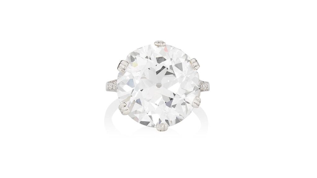 A brilliant-cut, 13.02-carat, G, VVS2 diamond ring with single- and rose-cut diamonds on the shoulders at Phillips image