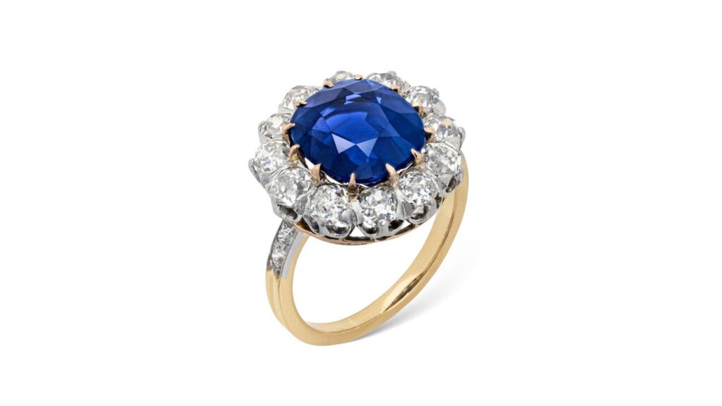 A sapphire ring from the early 20th century features a cushion-shaped, 5.33-carat Kashmir sapphire in an old-cut diamond frame at Christie's image