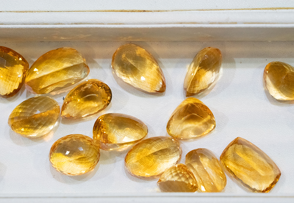 Mixed cuts of yellow topaz gemstones image