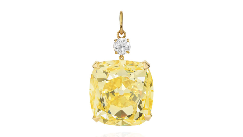 53.14-carat, fancy-vivid-yellow, internally flawless diamond pendant, suspended from a round brilliant diamond at Phillips image