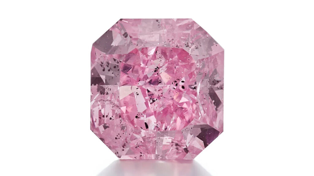 A unmounted cut-cornered rectangular modified brilliant-cut, 3.63-carat, fancy-vivid-purple-pink, I2-clarity diamond at Sotheby's image