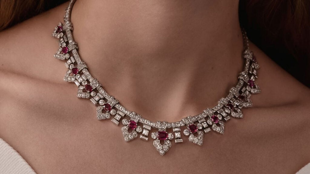 This Cartier necklace from circa 1935 features old brilliant-cut diamonds in palmette motifs, with additional baguette- and step-cut diamonds as well as oval and cushion-cut rubies graduating in size toward the center. The Burmese rubies weigh around 11 carats in total, and the diamonds approximately 22 carats at Bonhams image