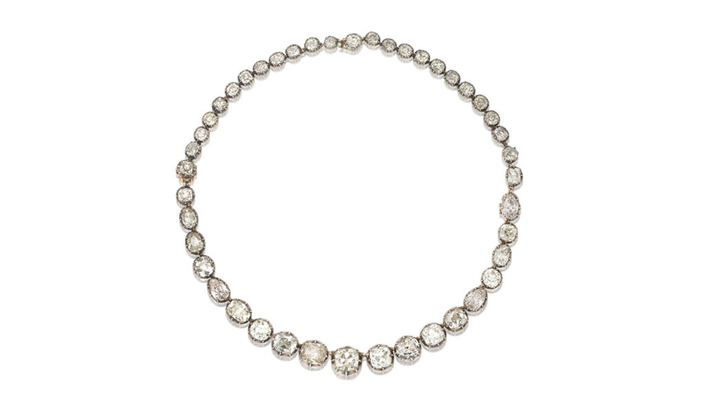This diamond rivière necklace, which can turn into a pair of bracelets, dates to the 19th century and contains old cushion-shaped, pear and brilliant-cut diamonds that increase in size toward the center. The largest cushion weighs 3.32 carats at Bonhams image
