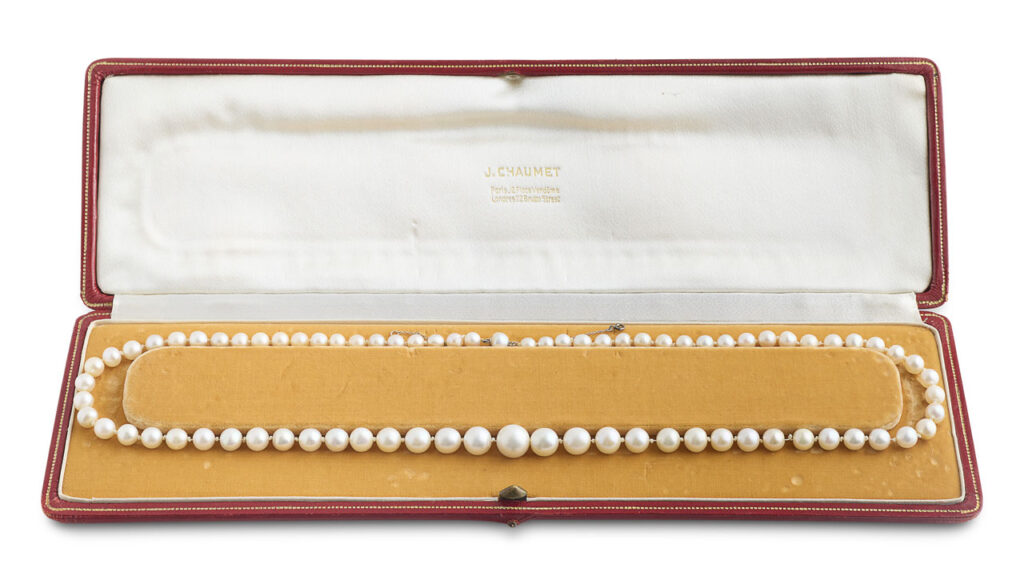 Chaumet designed this necklace in 1947. It comprises 78 round, oval and button-shaped pearls, 76 of which are listed as natural at Christie's image
