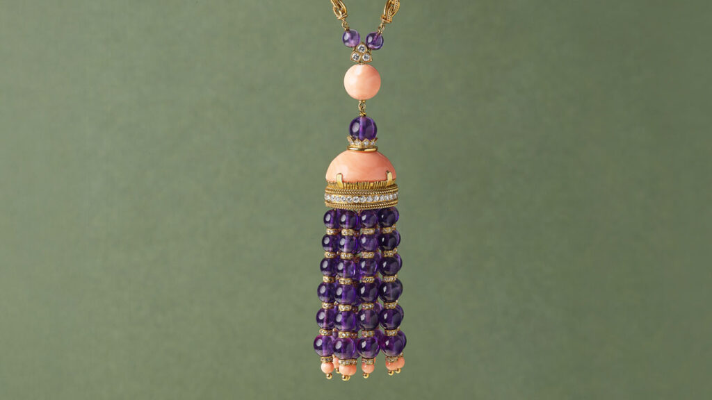 This Van Cleef & Arpels necklace from the 1970s sports a pendant with cabochon coral, drilled coral beads, amethyst beads, and 8.50 carats of round and rose-cut diamonds at Christie's image