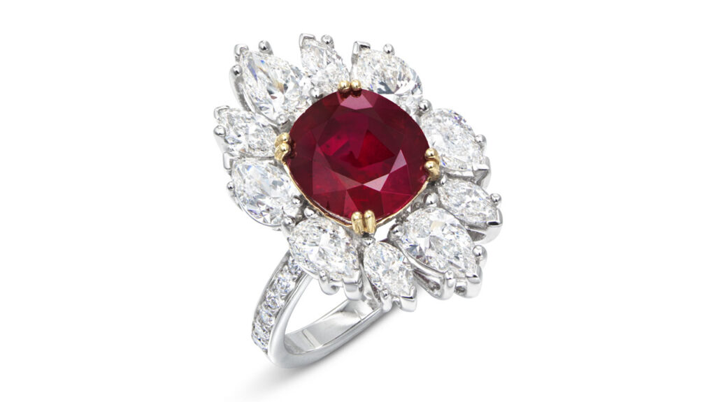 This ring bears an antique cushion-cut, 4.28-carat Burmese ruby in a surround of various-cut diamonds, with additional diamonds on the band at Christie's image
