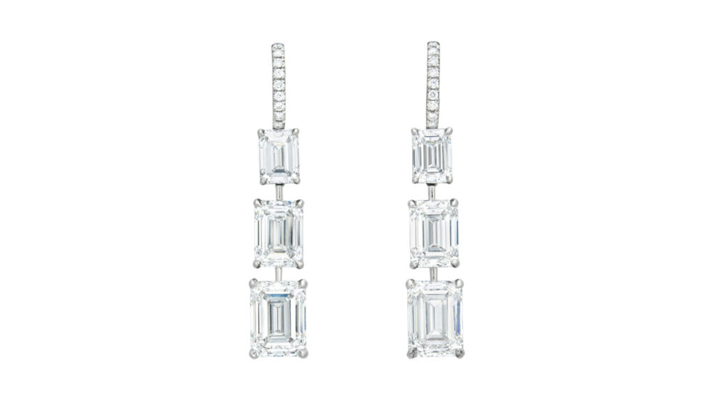 A pair of earrings containing six emerald-cut, D-color, internally flawless diamonds weighing between 1.01 and 3.01 carats — a total of 12.05 carats at Christie's image