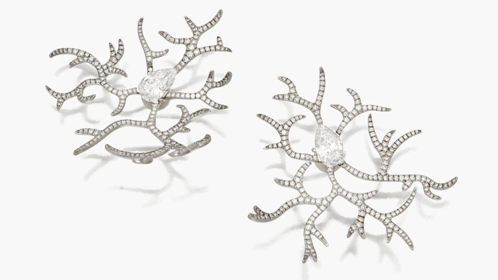These JAR earrings, designed to resemble frost, feature diamond-set branches radiating from pear-shaped diamonds at Sotheby's image