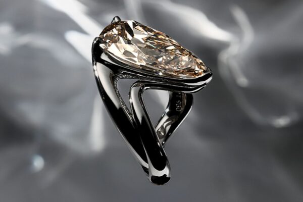 Platinum Pulsar ring set with a 10.26-carat antique pear-cut diamond. (Chard/NGHI for NN Jewels)