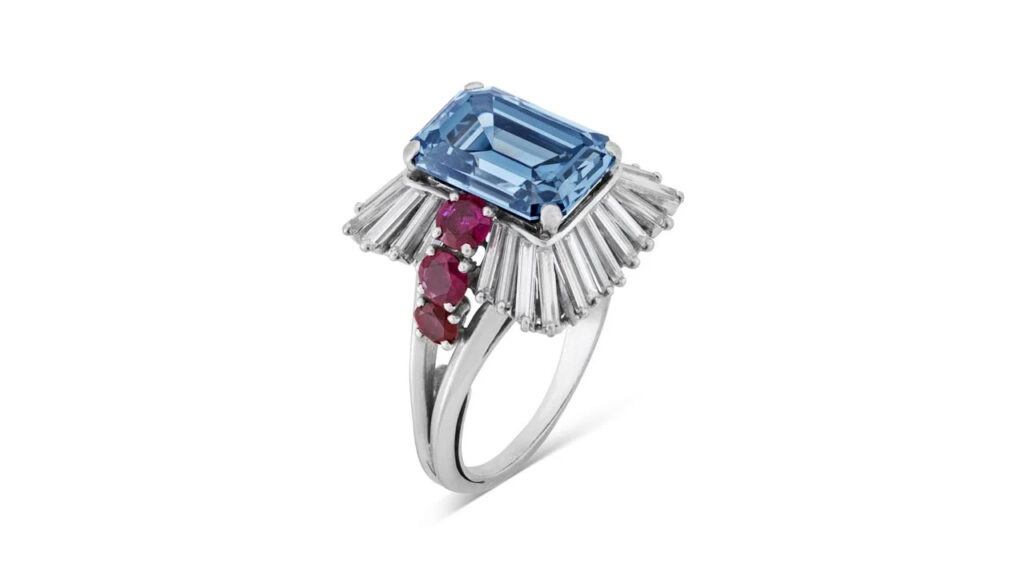 A Boucheron ring featuring an emerald-cut, 6.24-carat, fancy-deep-blue diamond, white diamonds and rubies at Chriatie's image