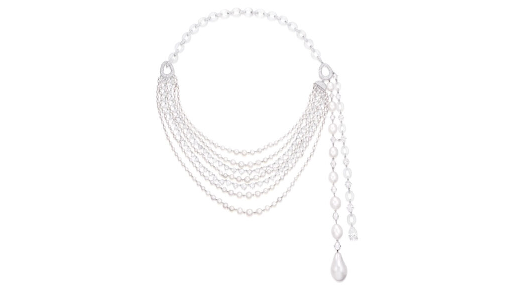 A House of Glenn Spiro necklace features a line of eight graduated natural pearls, highlighted by a pear-shaped 3.02-carat diamond, and decorated with natural pearls, seed pearls, oval, rose- and brilliant-cut diamonds, and icy jadeite hoops at Phillip image