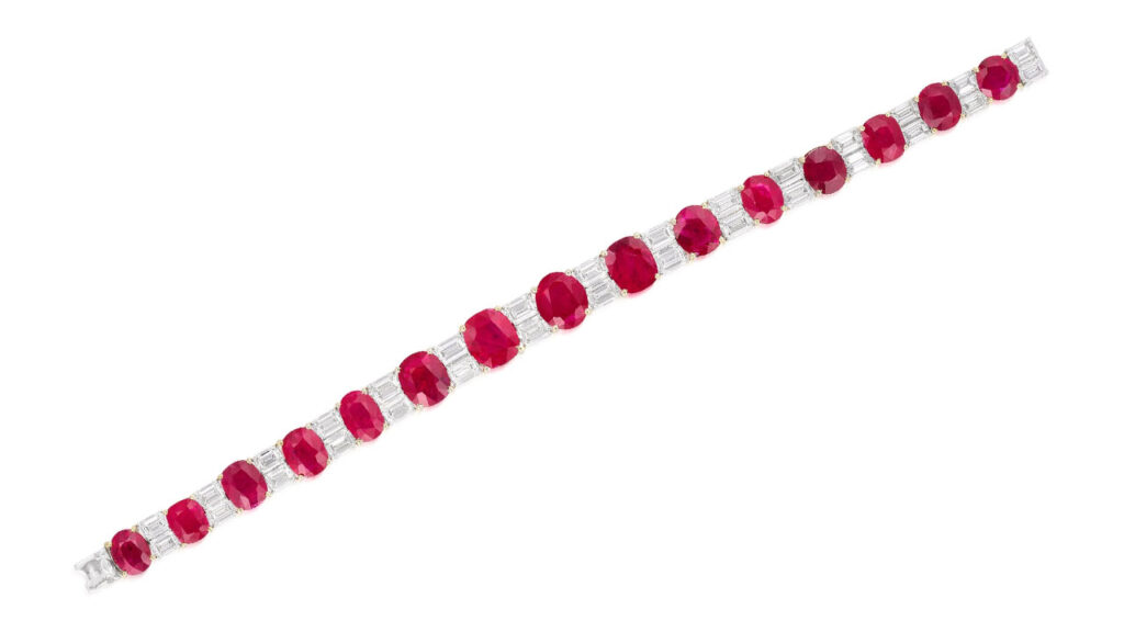 This bracelet features 15 graduated Burmese rubies totaling 30.21 carats, spaced by emerald-cut diamonds at Phillips image
