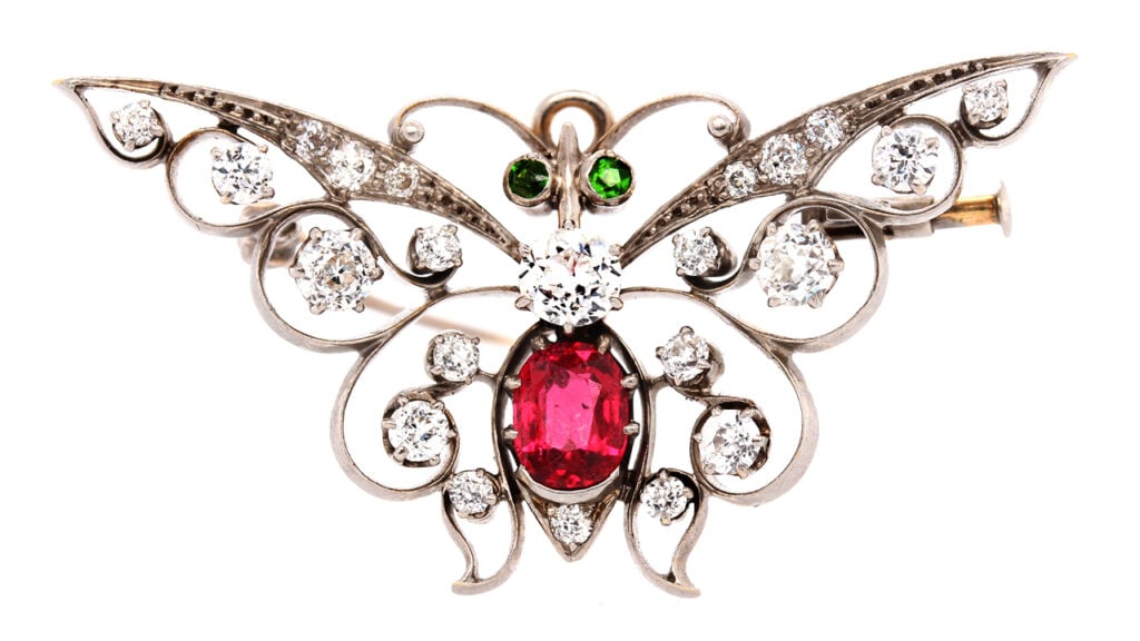 Edwardian butterfly brooch/ pendant with diamonds, spinel and garnets image