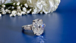 Engagement ring from Bromberg’s with an oval diamond and baguettes image