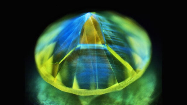 A yellow, type Ib/IaA High Pressure-High Temperature (HPHT) synthetic diamond image