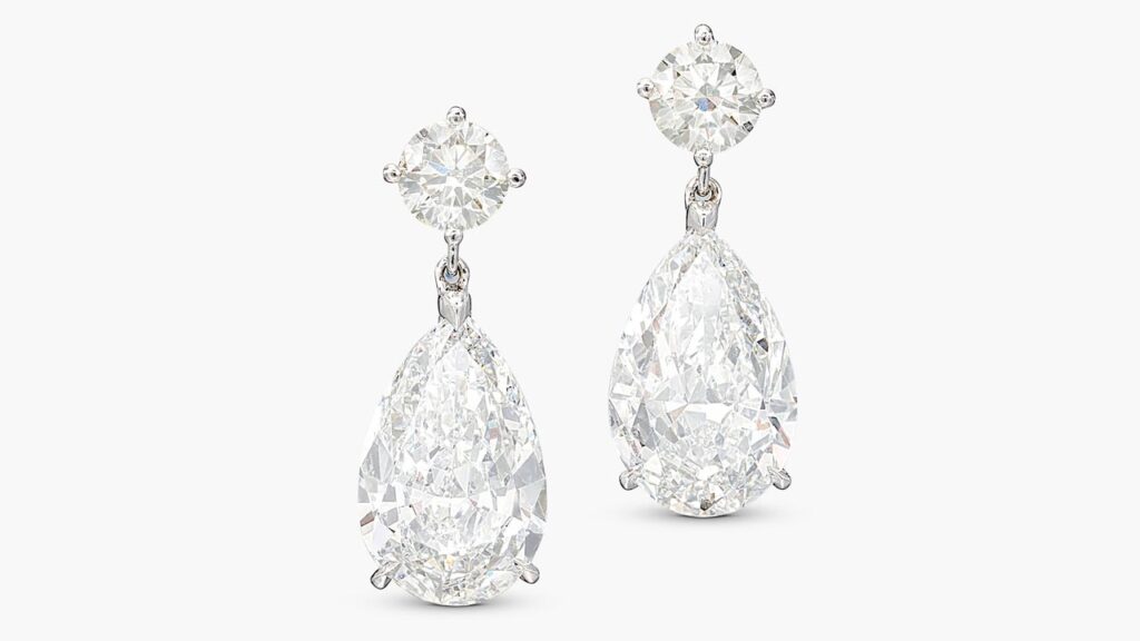 A pair of earrings sporting two pear-shaped, E-color, VVS2-clarity diamonds — of 3.10 and 3.16-carats — suspended from brilliant-cut diamonds at Sotheby's image