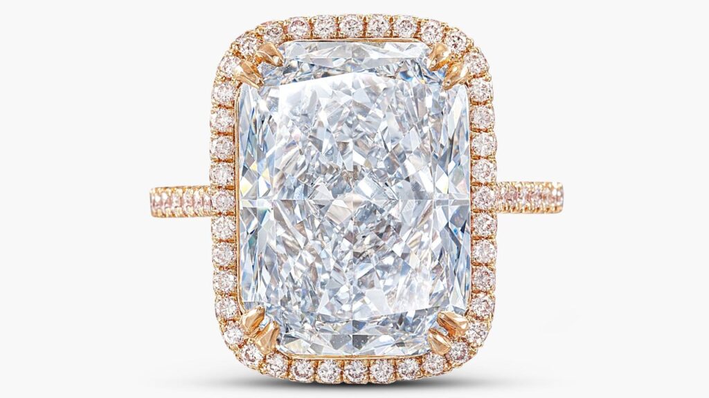 This ring features a cushion-shaped, 7.63-carat, fancy-blue, VVS1-clarity diamond in a surround of brilliant-cut diamonds with a pink tint by Sotheby's image