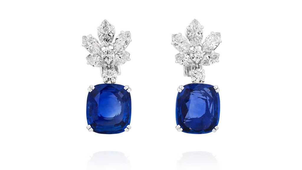 A pair of earrings sporting 12.31- and 12.69-carat Ceylon sapphires at Phillips image